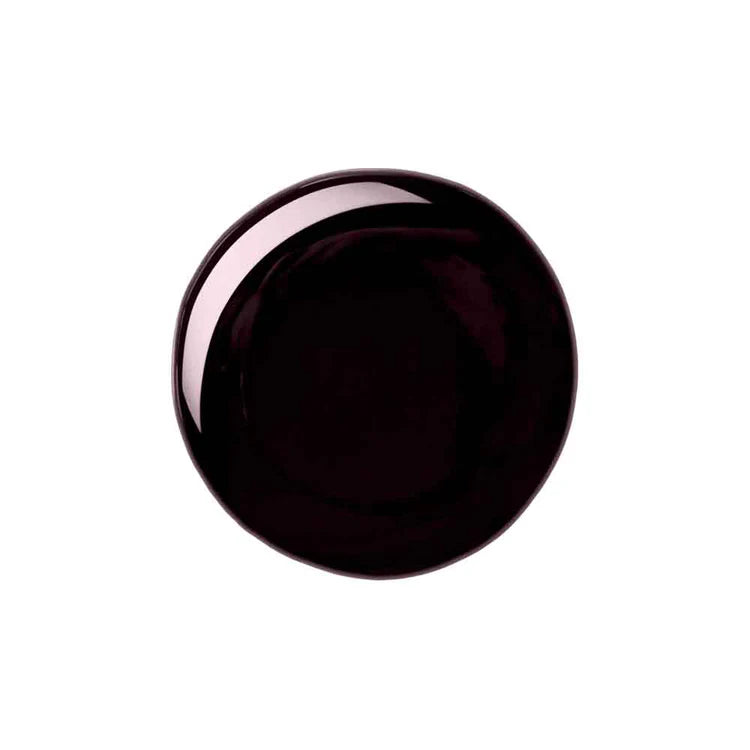 A glossy, dark plum-colored circular object, possibly a glass coaster or decorative tile, centered on a solid white background.