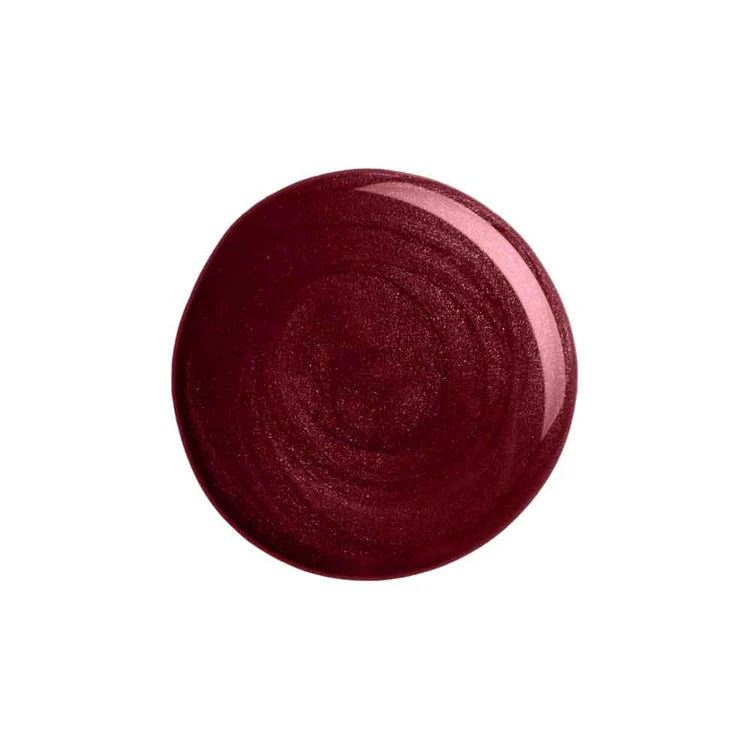 Red circular object with a textured surface on a white background