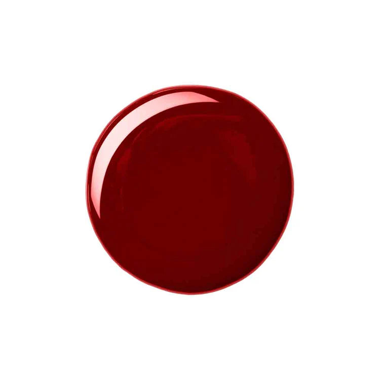 Red ceramic plate on a white background