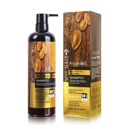 ArganOil Anti-Hair Fall Shampoo bottle and matching retail box, both featuring a dark brown bottle with a black pump and a label and box design in warm brown wood tones with golden argan nut illustrations.