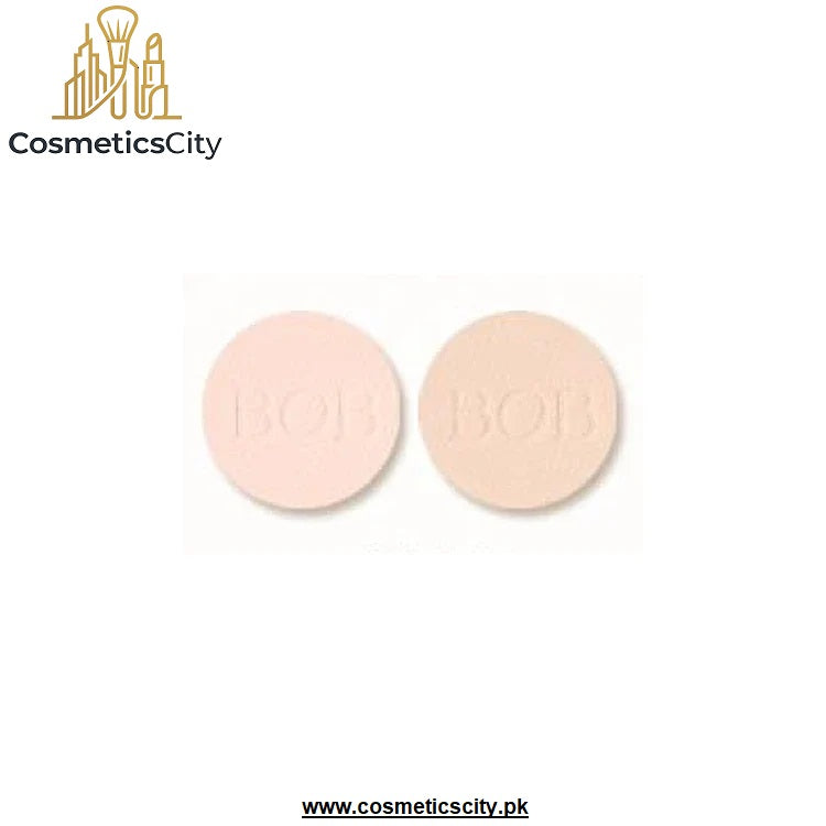 Two round pressed powder makeup pans, one light pink and one light beige, with 'BOB' embossed in the center, shown on a white background with the CosmeticsCity logo.