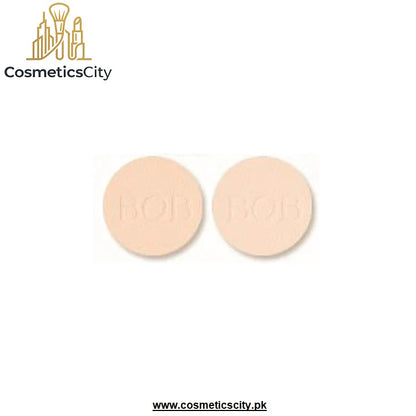 Two round beige makeup compact discs with the brand name 'BOB BOB' embossed in the center, displayed on a white background with a 'CosmeticsCity' logo in the top left and a website URL at the bottom.