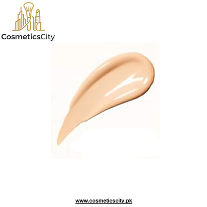 A swatch of liquid foundation in a warm beige shade, shown as a glossy smear on a white background with the CosmeticsCity logo in the top left corner.