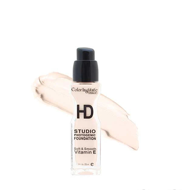 Foundation bottle with applicator on a white background