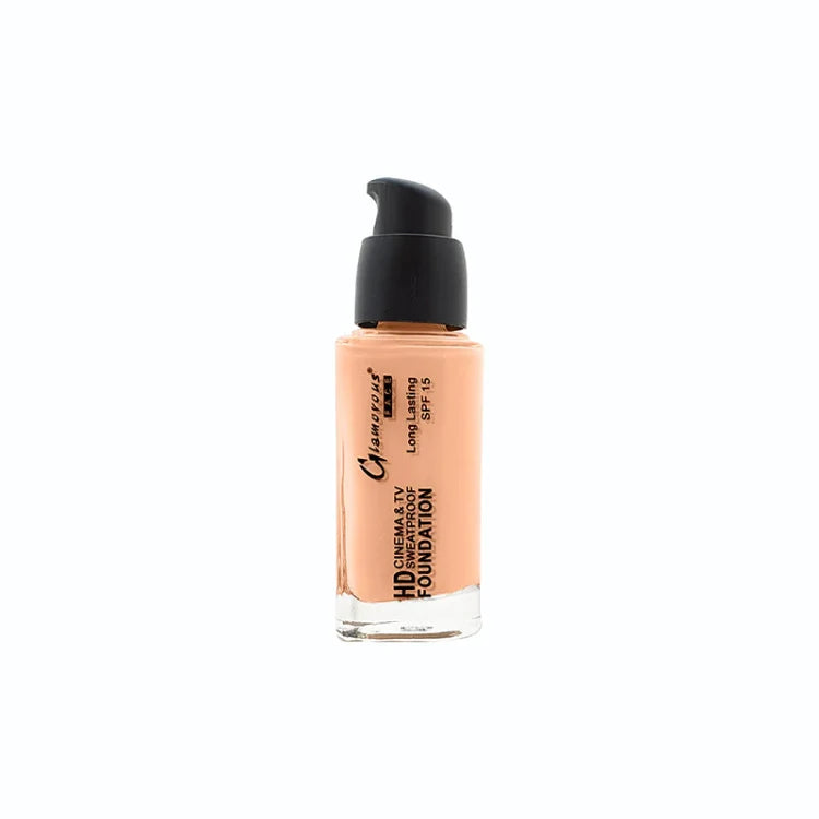 A bottle of Camilla's HD Cinema & TV Foundation in a warm peach-beige shade, featuring a black pump dispenser and clear glass bottle, set against a plain white background.